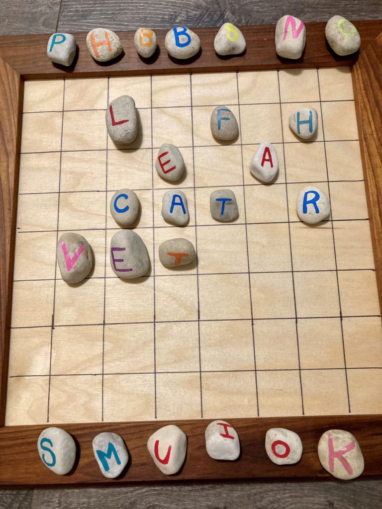 scrabble style game with literacy rocks